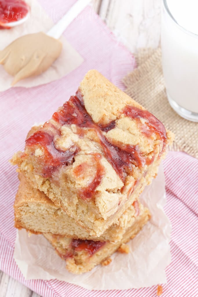 These Peanut Butter and Jelly Blondies are an easy dessert the whole family will love!