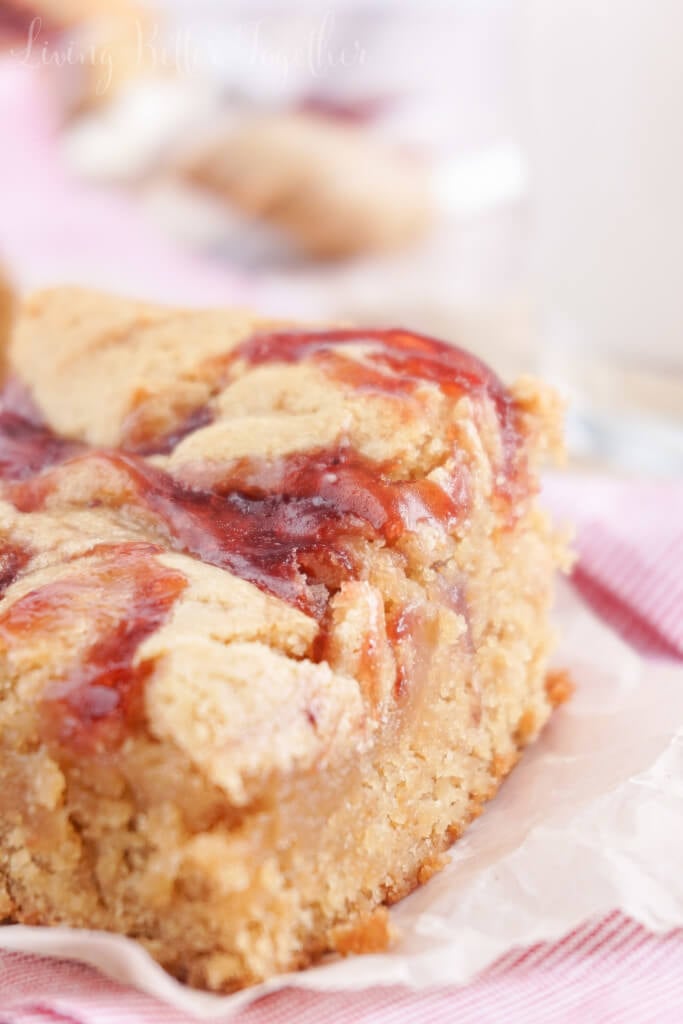 These Peanut Butter and Jelly Blondies are an easy dessert the whole family will love!