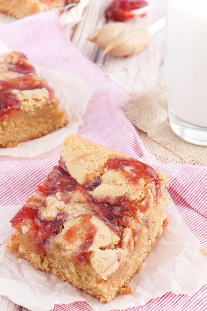 These Peanut Butter and Jelly Blondies are an easy dessert the whole family will love!