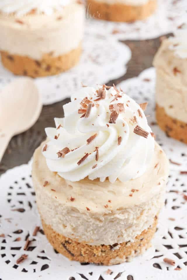 This Easy Peanut Butter Cheesecake is creamy and rich with a sweet graham cracker crust and classic whipped cream. Plus you can make a big one or mini ones!