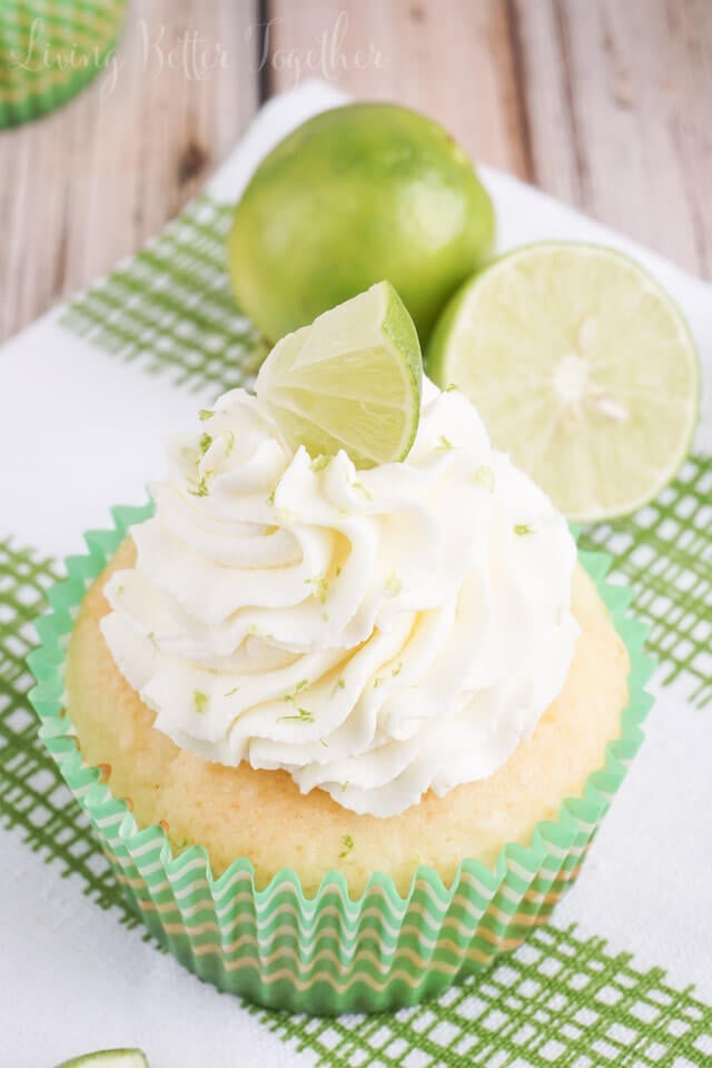 These Key Lime Pie Cupcakes are light and fluffy, filled with sweet key lime curd and topped with a whipped vanilla lime frosting!