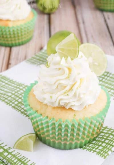 These Key Lime Pie Cupcakes are light and fluffy, filled with sweet key lime curd and topped with a whipped vanilla lime frosting!