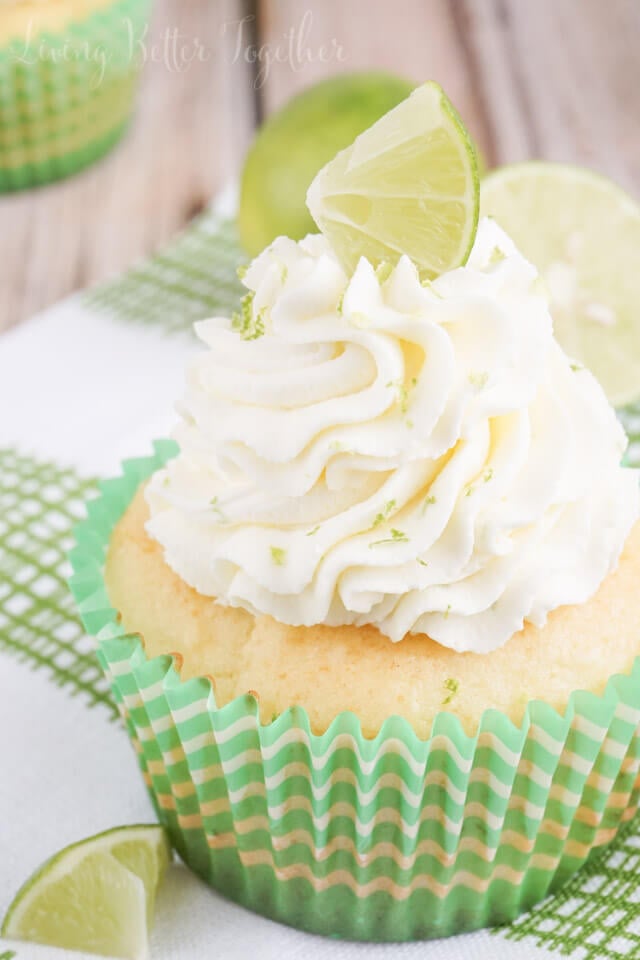 These Key Lime Pie Cupcakes are light and fluffy, filled with sweet key lime curd and topped with a whipped vanilla lime frosting!
