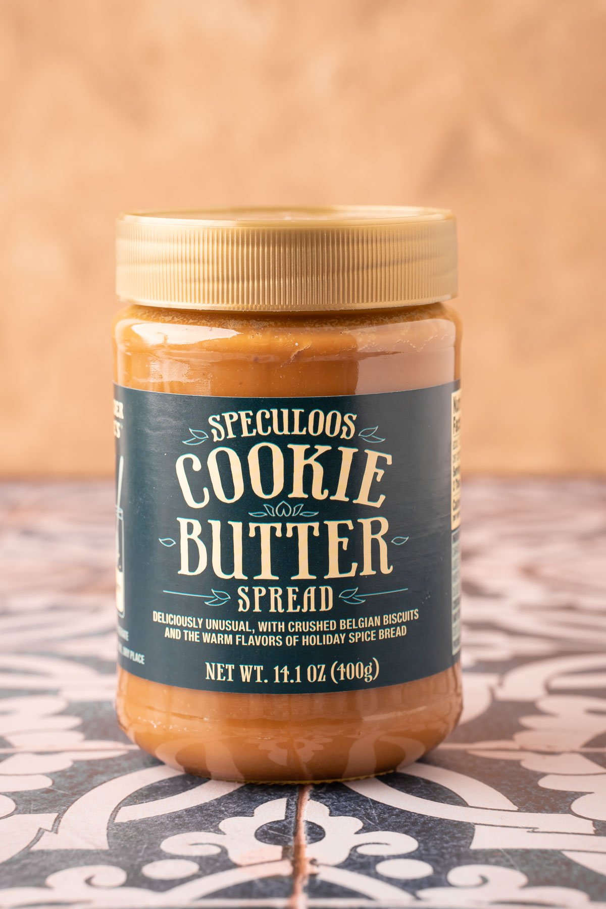 A jar of cookie butter on a table.