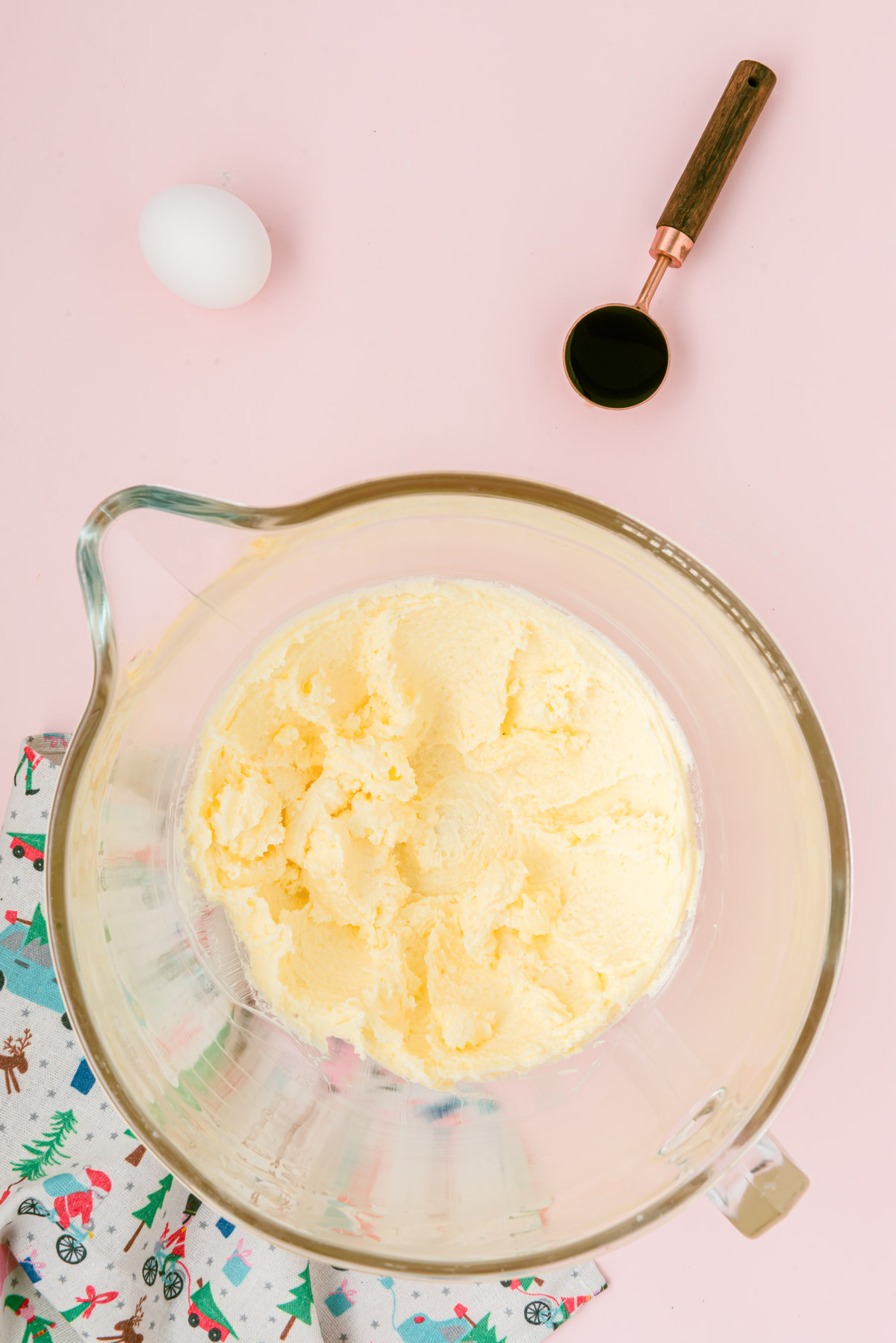 Butter and sugar creamed in a mixing bowl.