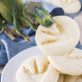 T-Rex Toy biting cookie