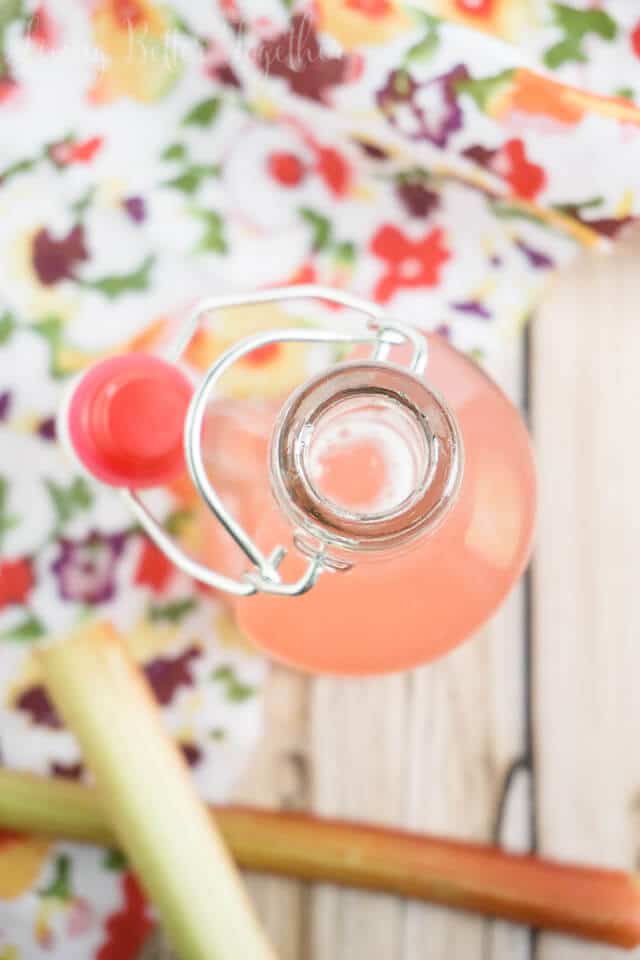This 3-Ingredient Rhubarb Simple Syrup is the perfect addition to summer drinks, cakes, and ice cream. Plus, it's super easy to make!