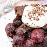 Black Forest Cobbler on a plate with whipped cream