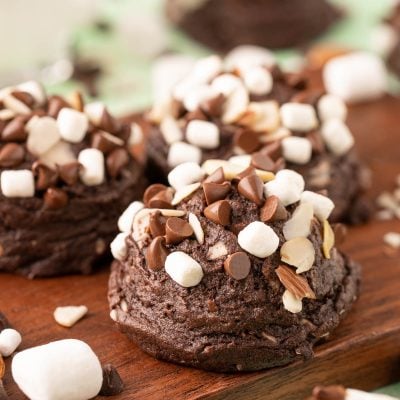 Rocky Road Cookies on a wooden serving board.