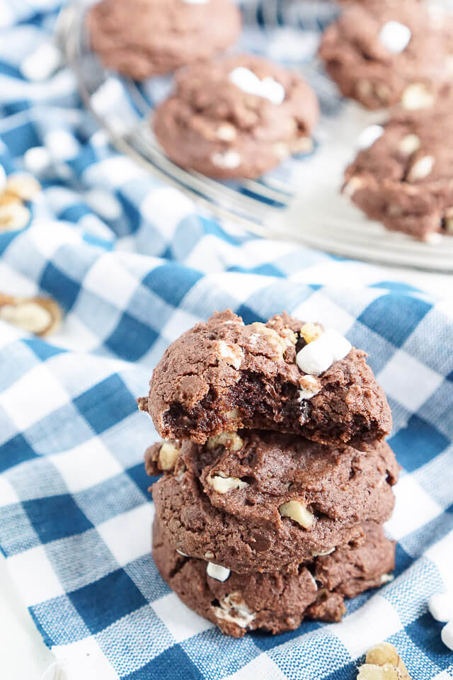 These Rocky Road Pudding Cookies are loaded up with chocolate chips, walnuts, and marshmallows and have a soft and chewy brownie-like center!