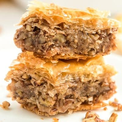 Two pieces of Baklava stacked on top of each other.