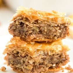 Two pieces of Baklava stacked on top of each other.