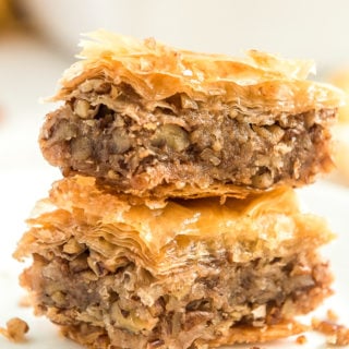 Two pieces of Baklava stacked on top of each other.