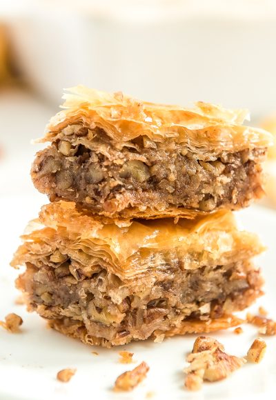 Two pieces of Baklava stacked on top of each other.