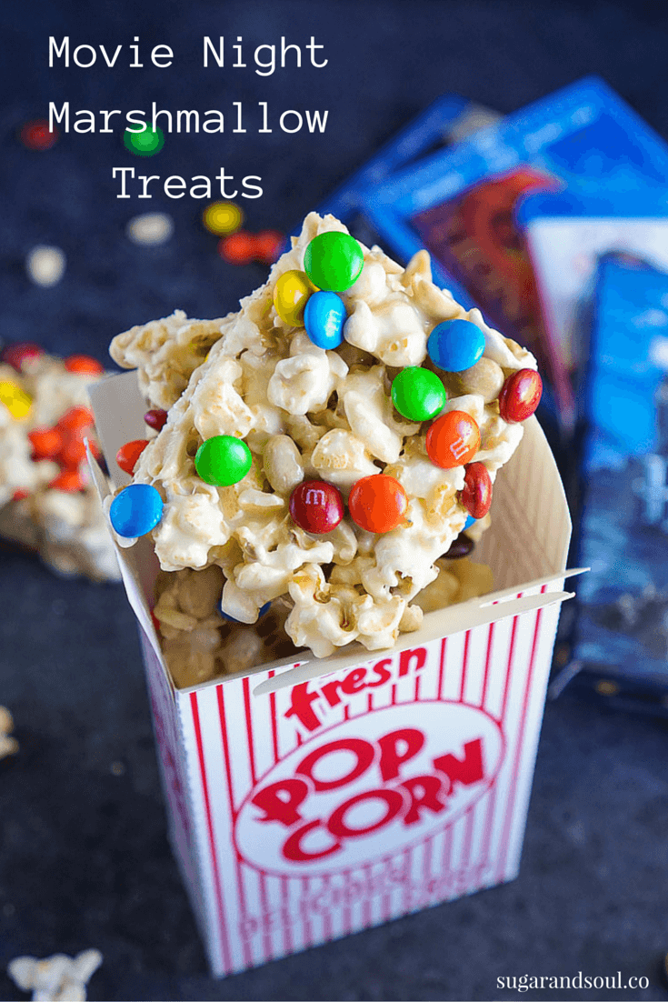 These Movie Night Marshmallow Treats are so easy to whip up! A buttery marshmallow treat loaded up with popcorn, peanuts, and chocolate - Perfect for movie night!