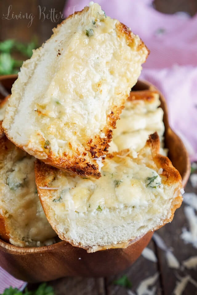 This 15-Minute Blue Cheese Garlic Bread is studded with flavor thanks to a vibrant blend of cheese, butter, and fresh herbs!