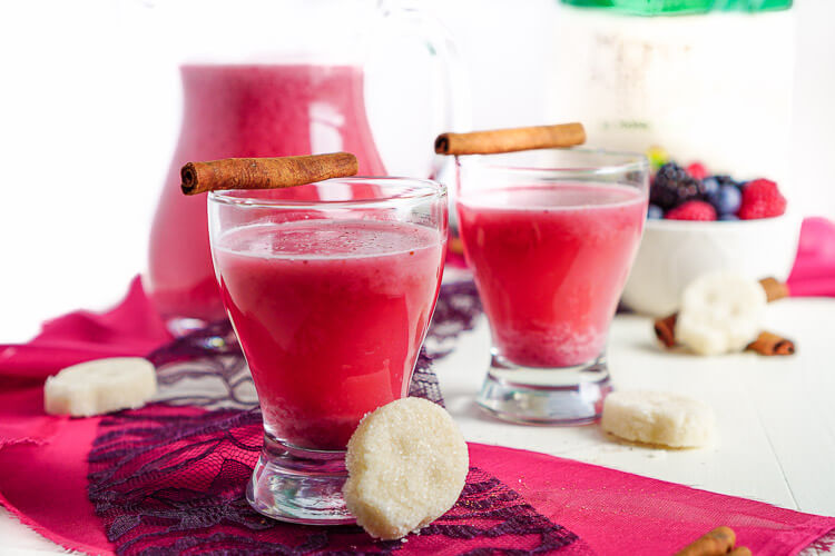 This Berry Horchata is a fun twist on the classic Mexican drink! Fresh berries, rice, cinnamon, and sugar skull sugar cubes make this a great addition to your Día de Muertos celebrations!