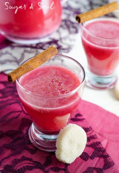 This Berry Horchata is a fun twist on the classic Mexican drink! Fresh berries, rice, cinnamon, and sugar skull sugar cubes make this a great addition to your Día de Muertos celebrations!