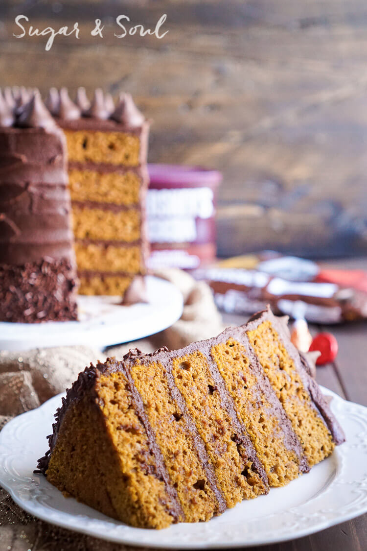 This Chocolate Pumpkin Cake is the ultimate pumpkin and chocolate combo for fall! Five layers of sweet and fluffy pumpkin cake wrapped in a whipped chocolate buttercream frosting!