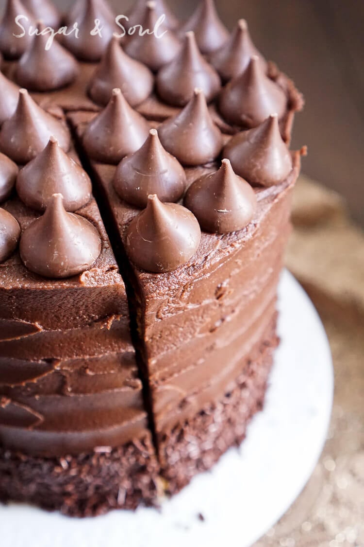 This Chocolate Pumpkin Cake is the ultimate pumpkin and chocolate combo for fall! Five layers of sweet and fluffy pumpkin cake wrapped in a whipped chocolate buttercream frosting!