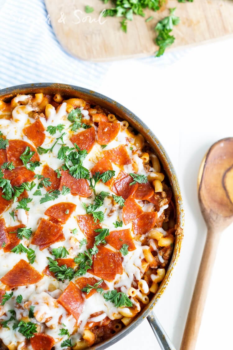This One Pan Pizza Pasta is what weeknight dreams are made of! Pizza and pasta come together in an easy meal loaded with flavor that's ready in less than 30 minutes!