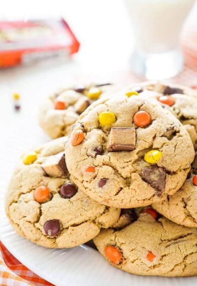 These Overloaded Reese's Peanut Butter Pudding Cookies are a sweet peanut butter cookie full of Reese's Pieces and Chunks of Reese's Peanut Butter Cups.