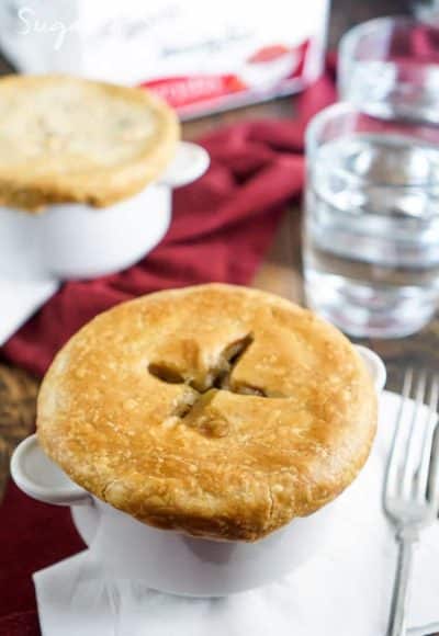 This Tourtière is a traditional Spiced Meat Pie made in Quebec, beef and veggies with cinnamon and clove give this dish a unique cozy flavor perfect for cold weather.