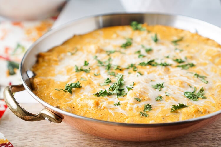 This Baked Buffalo Chicken Dip is made with real cream and blue cheeses, rotisserie chicken, hot sauce and spices for a sensational appetizer that's sure to please! Plus, it's ready in less than 30 minutes!