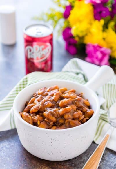 These Dr Pepper Baked Beans are a sweet and delicious side dish that's ready in less than an hour! Perfect for BBQ's and game day parties!