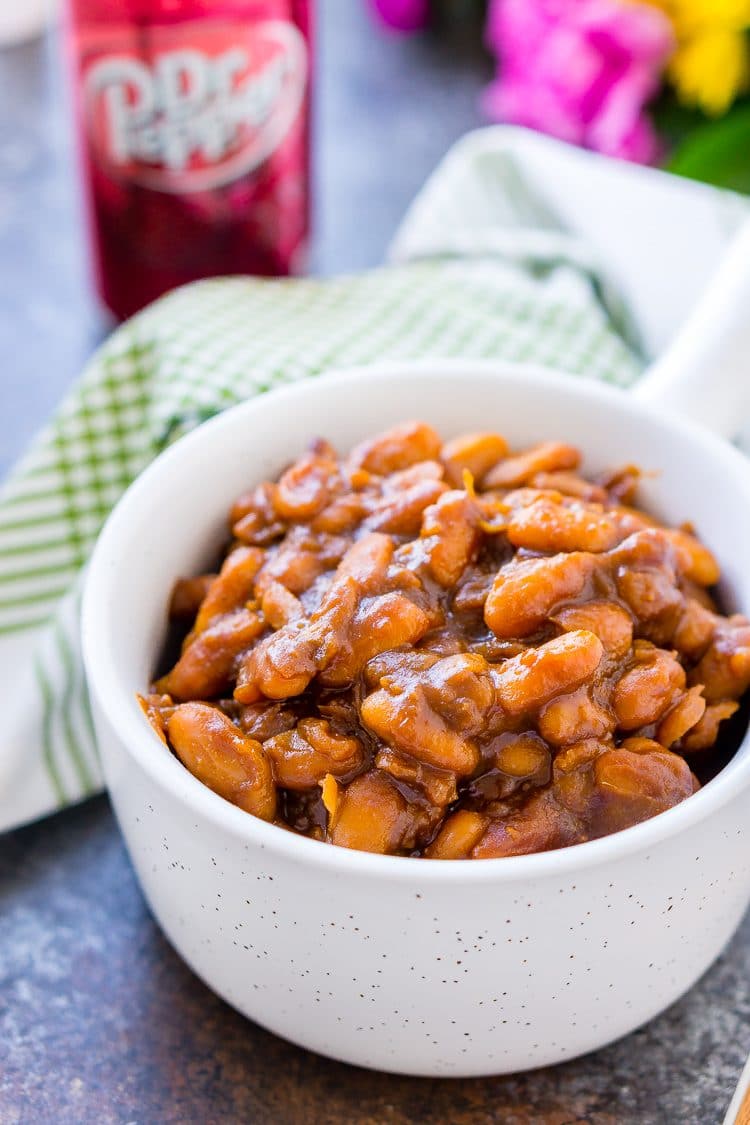 These Dr Pepper Baked Beans are a sweet and delicious side dish that's ready in less than an hour! Perfect for BBQ's and game day parties!