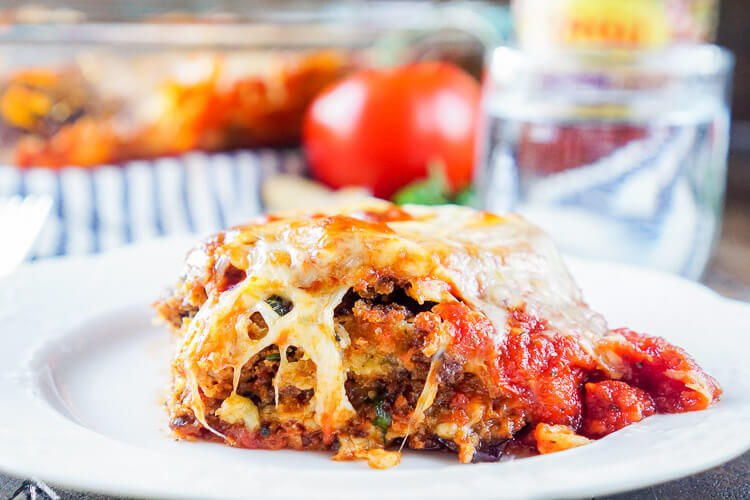 This Eggplant Parmesan is made with layers of eggplant, cheese, sauce, and memories. An easy and mouthwatering Italian classic you'll make again and again!