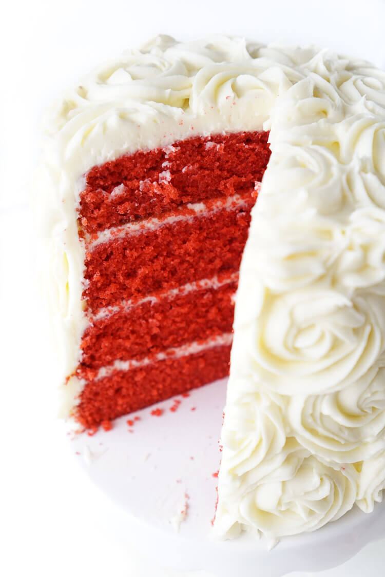 Red Velvet Cake, aka President Snow's White Rose Cake, is a red velvet cake frosted in cream cheese buttercream and inspired by The Hunger Games trilogy and perfect for Valentine's Day too!