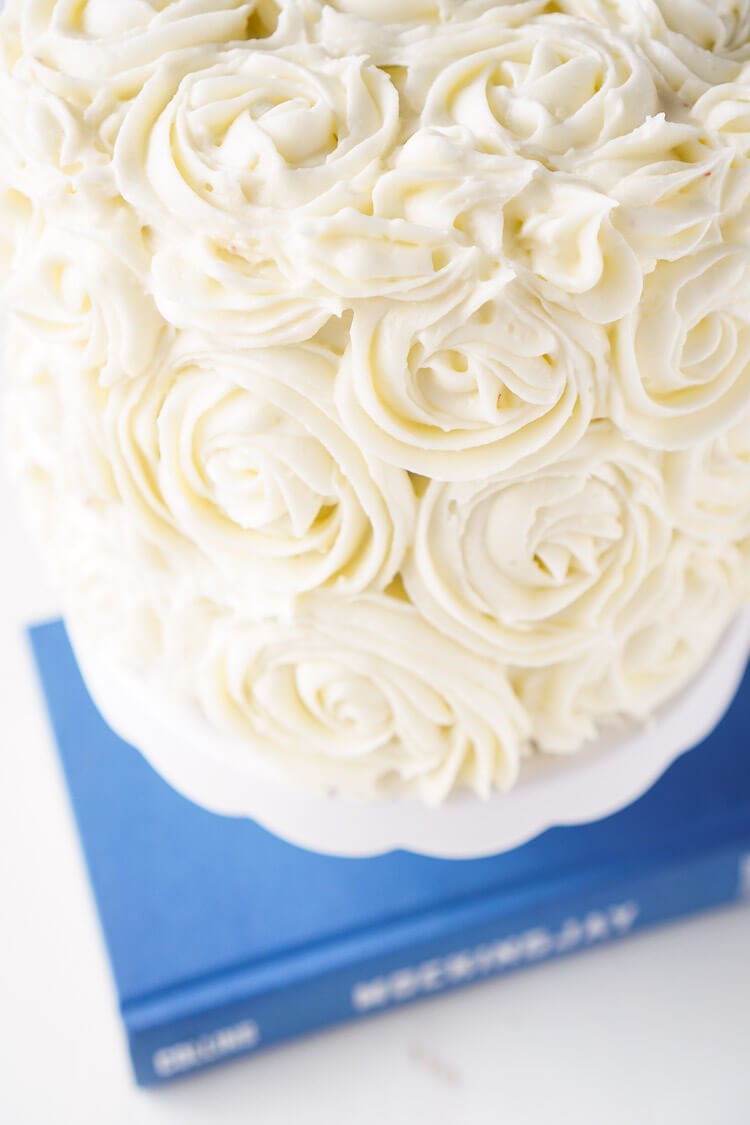 Red Velvet Cake, aka President Snow's White Rose Cake, is a red velvet cake frosted in cream cheese buttercream and inspired by The Hunger Games trilogy and perfect for Valentine's Day too!