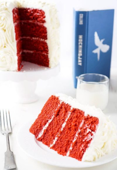 Red Velvet Cake, aka President Snow's White Rose Cake, is a red velvet cake frosted in cream cheese buttercream and inspired by The Hunger Games trilogy and perfect for Valentine's Day too!