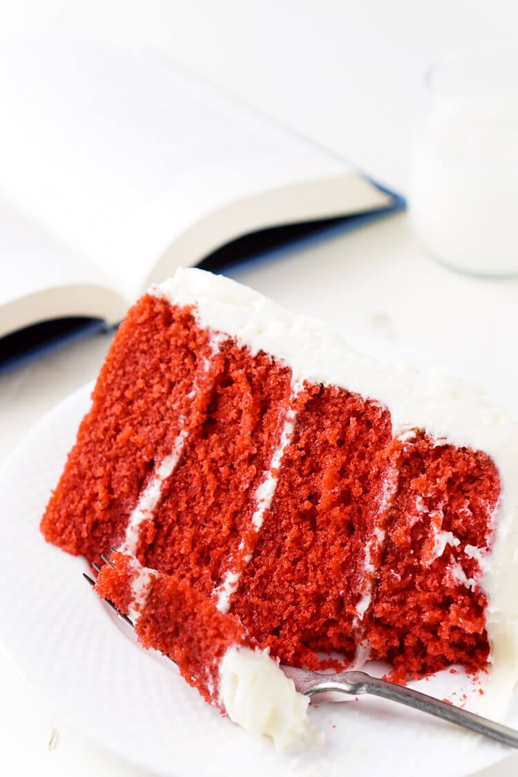 Red Velvet Cake, aka President Snow's White Rose Cake, is a red velvet cake frosted in cream cheese buttercream and inspired by The Hunger Games trilogy and perfect for Valentine's Day too!