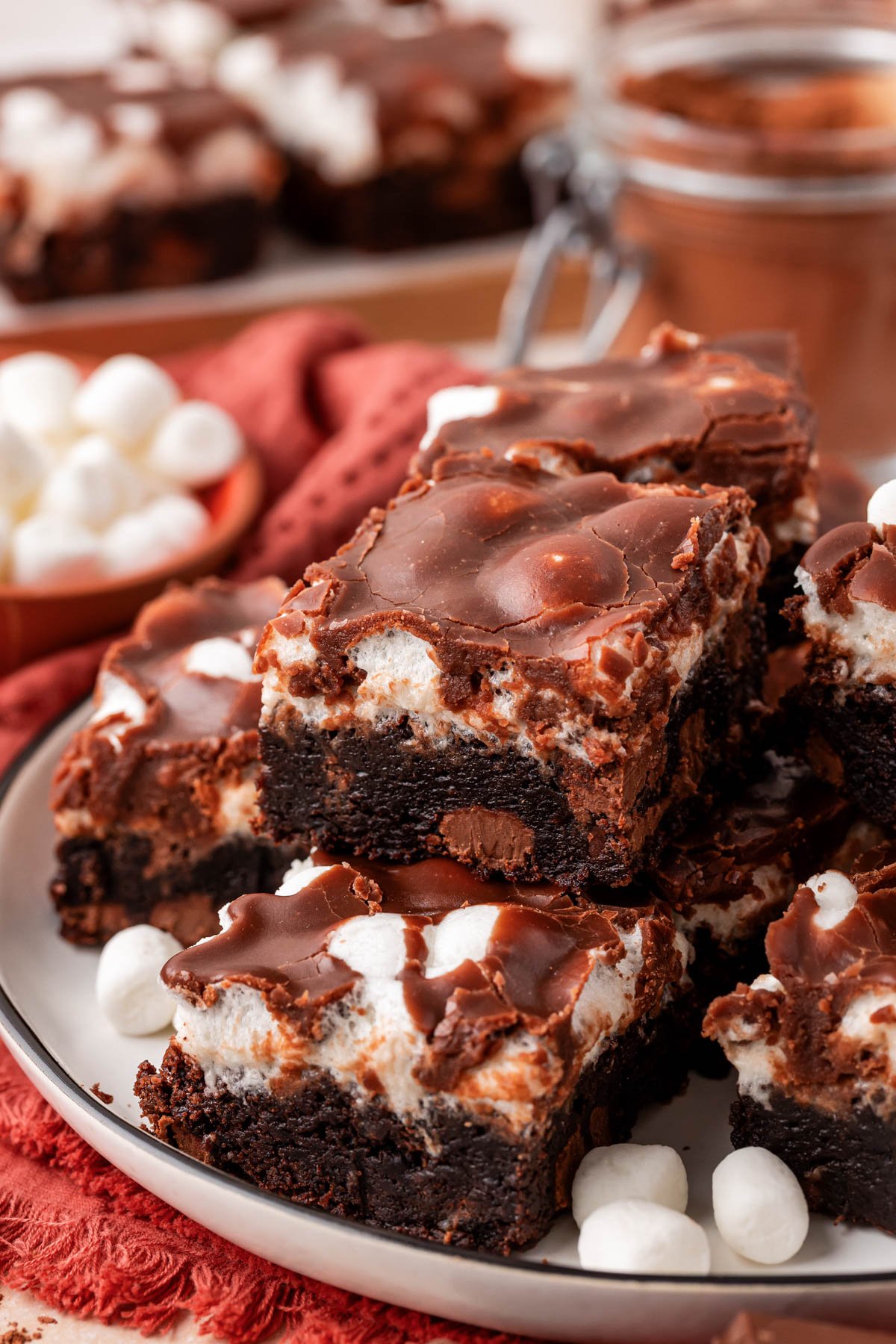 A plate full of marshmallow brownies.