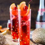 This Champagne Shirley Temple switches out soda for some bubbly for a twist on the classic! This is a great new years eve drink and perfect for other parties throughout the year! Just a few ingredients and you'll have a classy cocktail worth celebrating with!