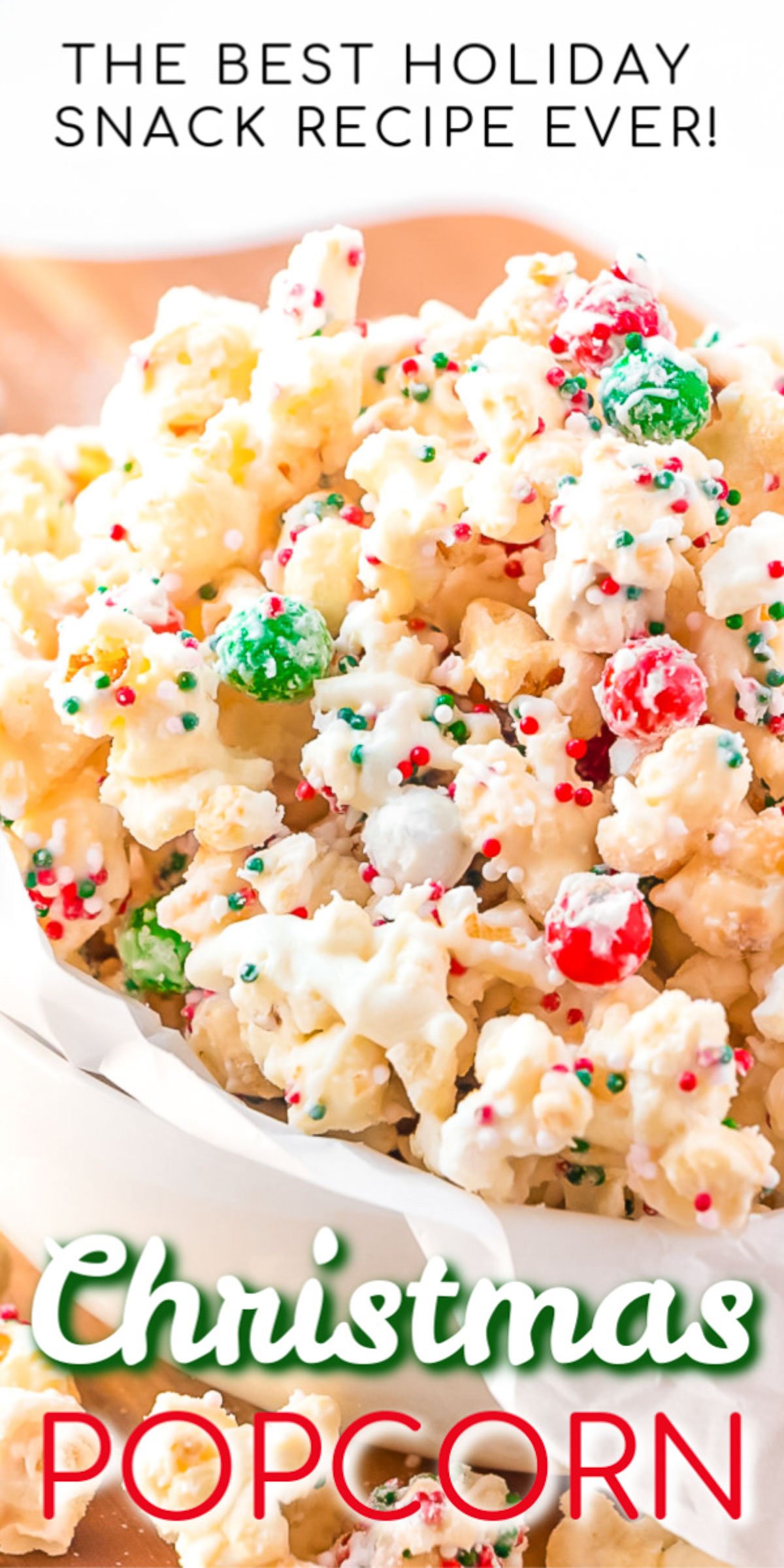 Christmas Popcorn is an easy a delicious treat made with kettle corn, cake mix, white chocolate, and sprinkles! It's perfect for a Christmas Movie Night!  via @sugarandsoulco