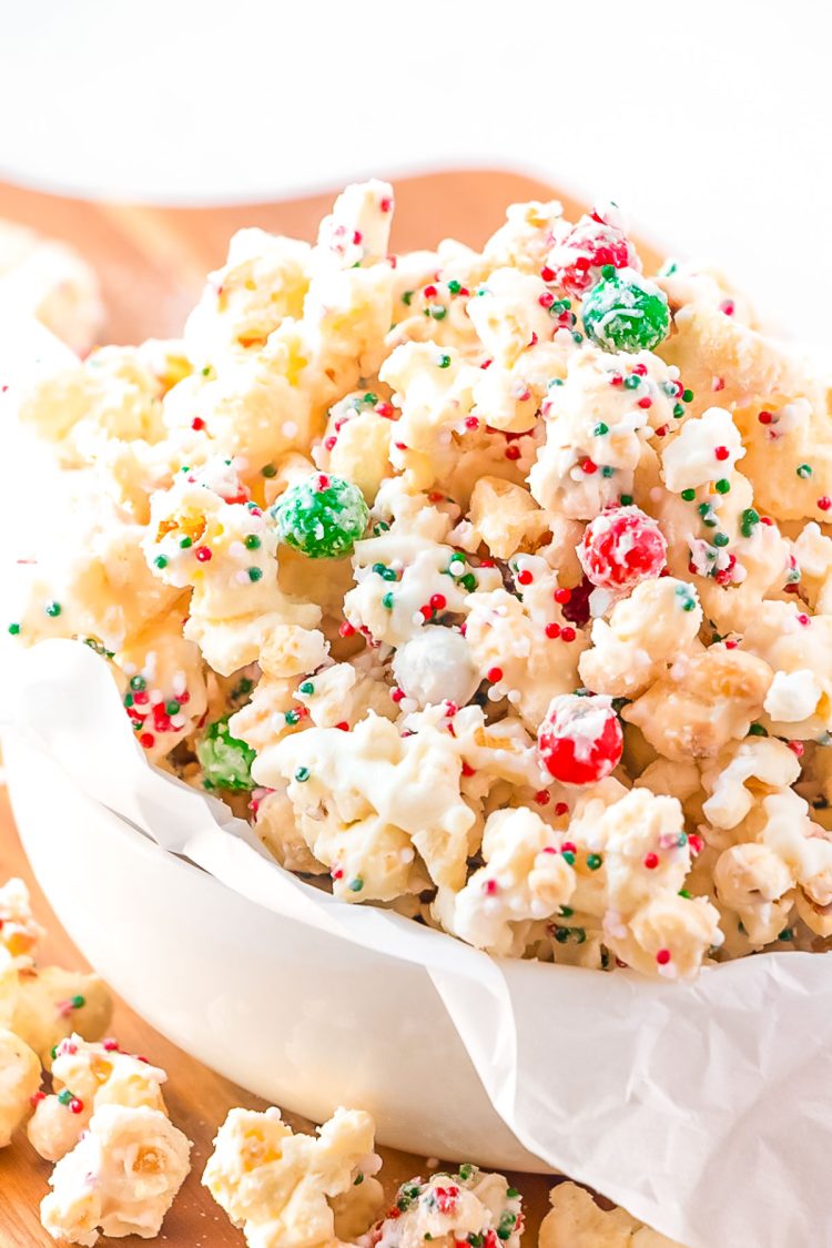 Close up photo of Christmas Popcorn in a small white bowl.