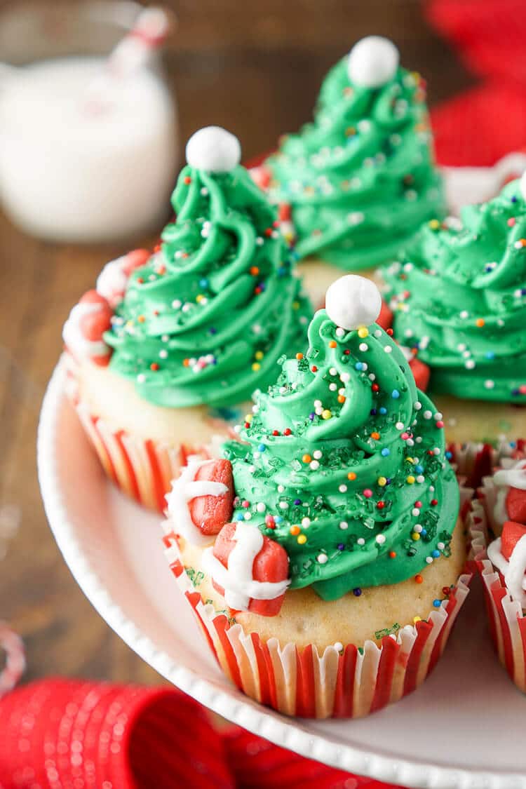 I love these Christmas Tree Cupcakes! They're so cute and great to make with the kids! Plus they're easier than they look and are such a fun and festive dessert for holiday parties!