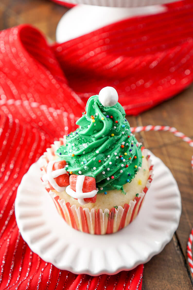 I love these Christmas Tree Cupcakes! They're so cute and great to make with the kids! Plus they're easier than they look and are such a fun and festive dessert for holiday parties!