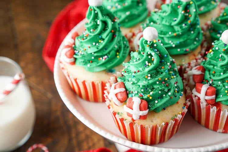 I love these Christmas Tree Cupcakes! They're so cute and great to make with the kids! Plus they're easier than they look and are such a fun and festive dessert for holiday parties!