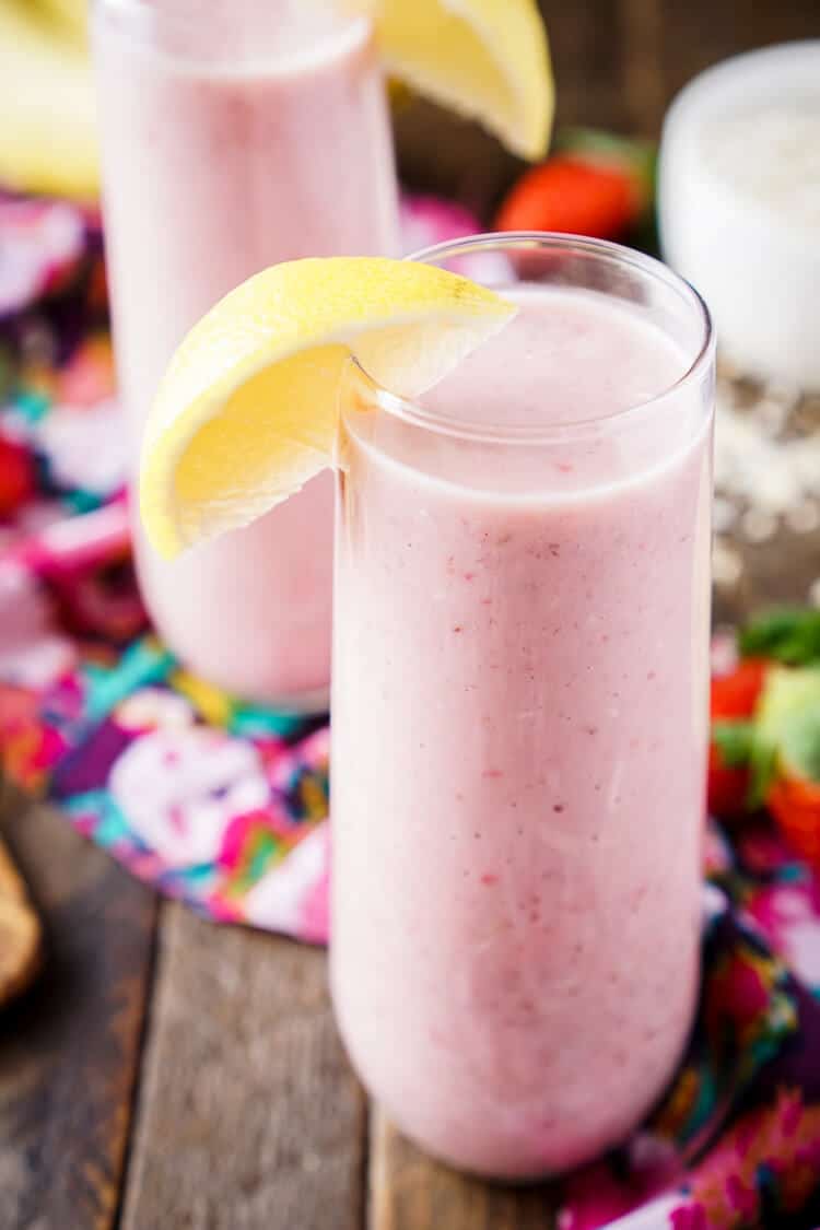 This Strawberry Banana Lemon Smoothie is a bright and delicious way to start the day! A balanced blend of fresh fruit, yogurt, nut milk, flax, and oatmeal!