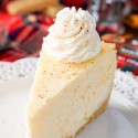 This Eggnog Cheesecake Recipe is enclosed in a sweet shortbread cookie crust and laced with whisky and nutmeg for the ultimate holiday dessert!