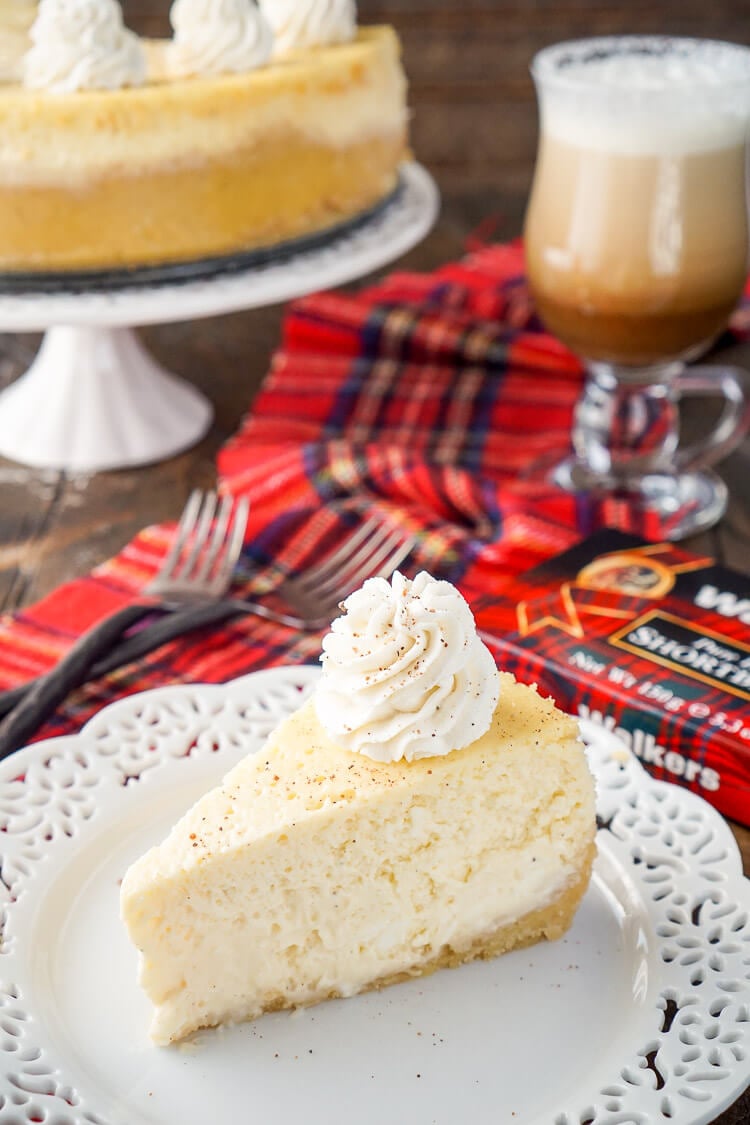 This Eggnog Cheesecake Recipe is enclosed in a sweet shortbread cookie crust and laced with whisky and nutmeg for the ultimate holiday dessert!