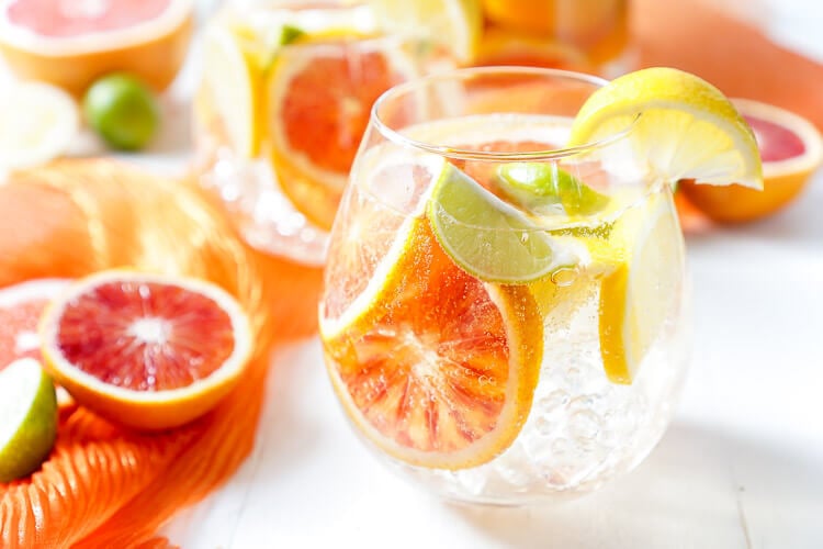 This Citrus Sangria is packed with fresh ruby red grapefruit, blood oranges, lemons, and key limes for a bright and zesty cocktail perfect for a party!v