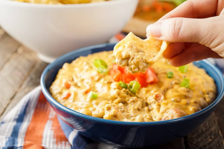 This Cheeseburger Dip tastes just like a Cheeseburger, making it the ultimate game day dip everyone will love! Super fast and EASY to make, loaded with flavors that will have your mouthwatering, plus it makes a ton so it's great for large groups and parties!