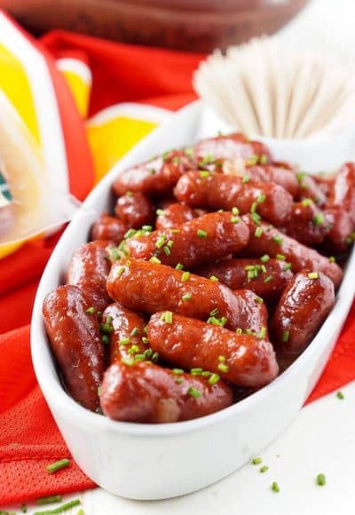 These Spicy Blood Orange Lit'l Smokies sausages are an easy appetizer with Asian flair and a hint of heat that's perfect for game days! Made in the crock pot and ready in less than 2 hours!