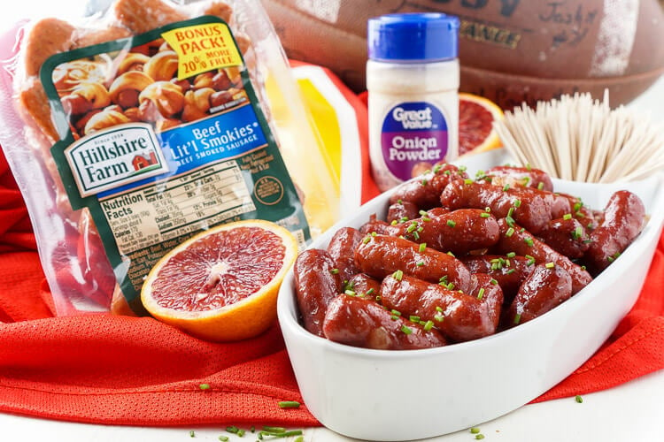 These Spicy Blood Orange Lit'l Smokies sausages are an easy appetizer with an Asian flair and a hint of heat that's perfect for game days! Made in the crock pot and ready in less than 2 hours!