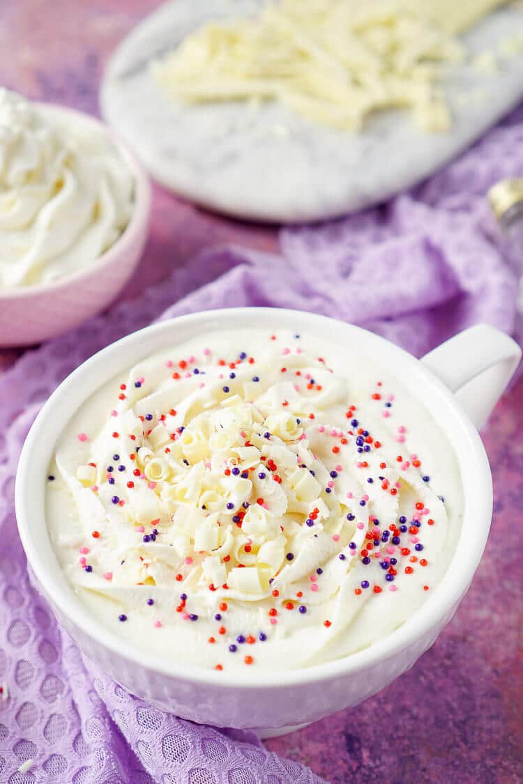 This Boozy or Not White Hot Chocolate is a fun dessert beverage everyone can enjoy! A simple and sweet concoction to warm you up during the winter months! Perfect for Valentine's Day and Christmas!